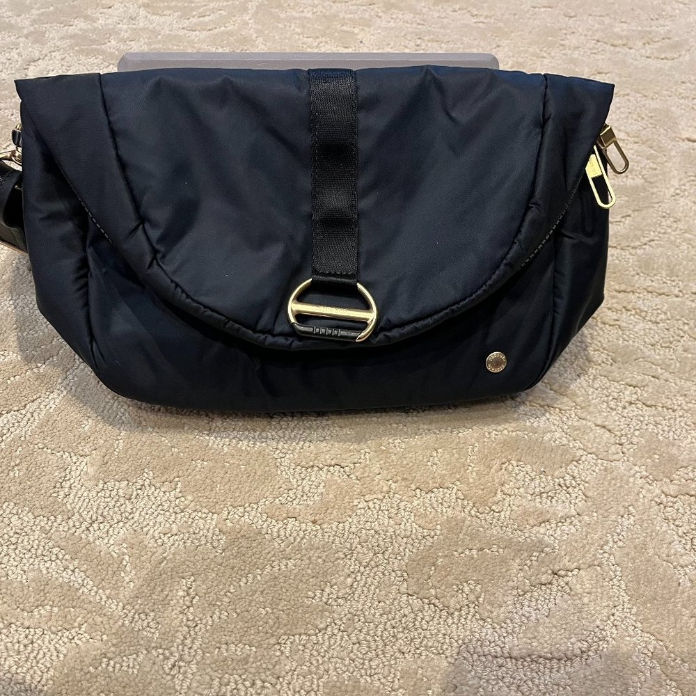 Black PacSafe Convertible Backpack Purse- 13. 8"H x 9. 8"W x 4. 3"D